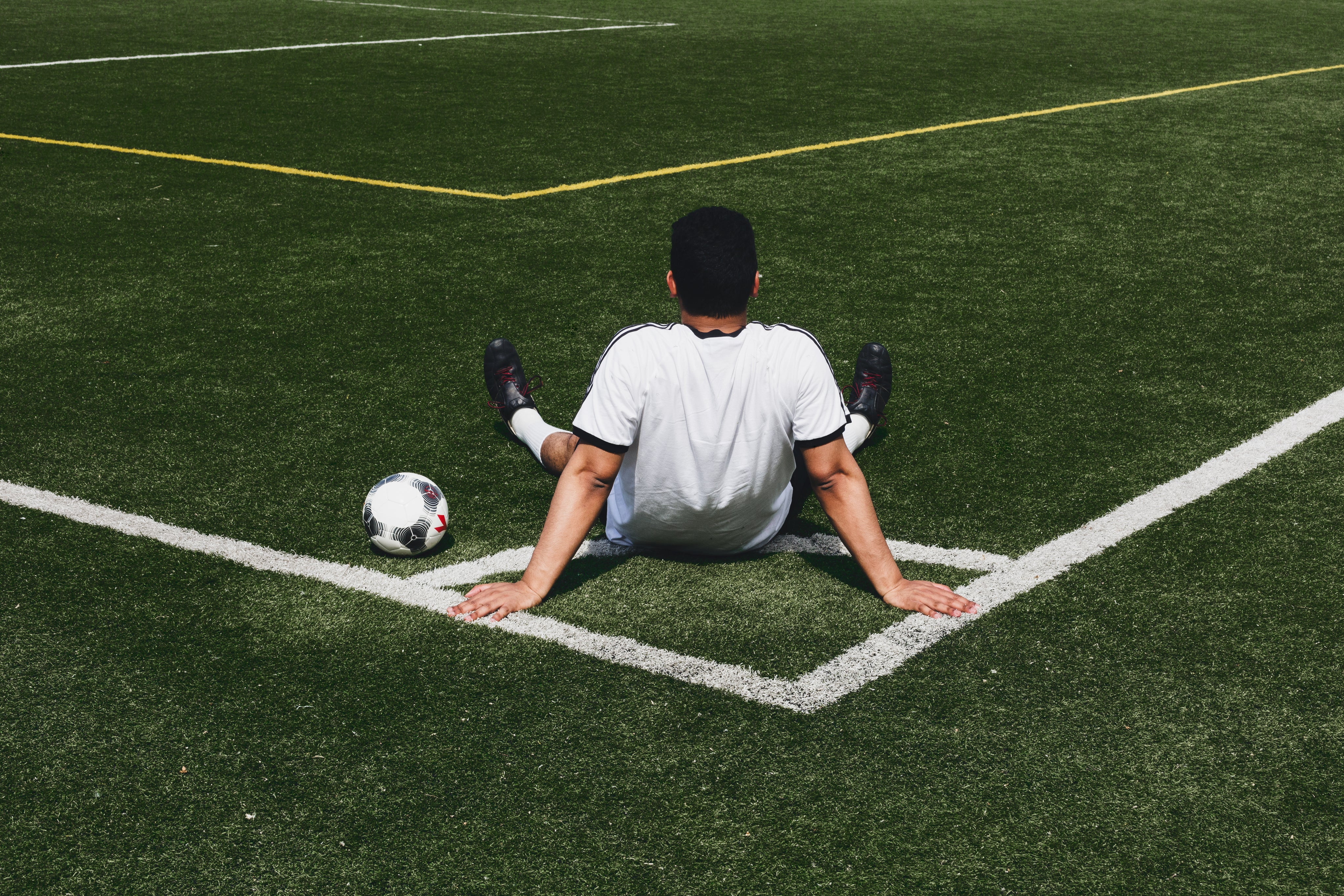 files/soccer-player-sits-at-field-corner.jpg